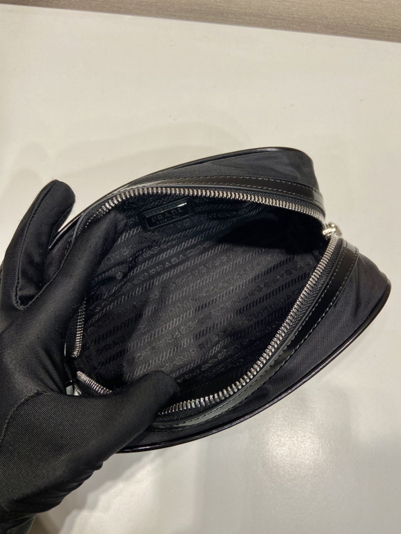 Pra*a clutch bags